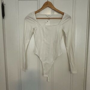 Elegant White Long Sleeve Bodysuit